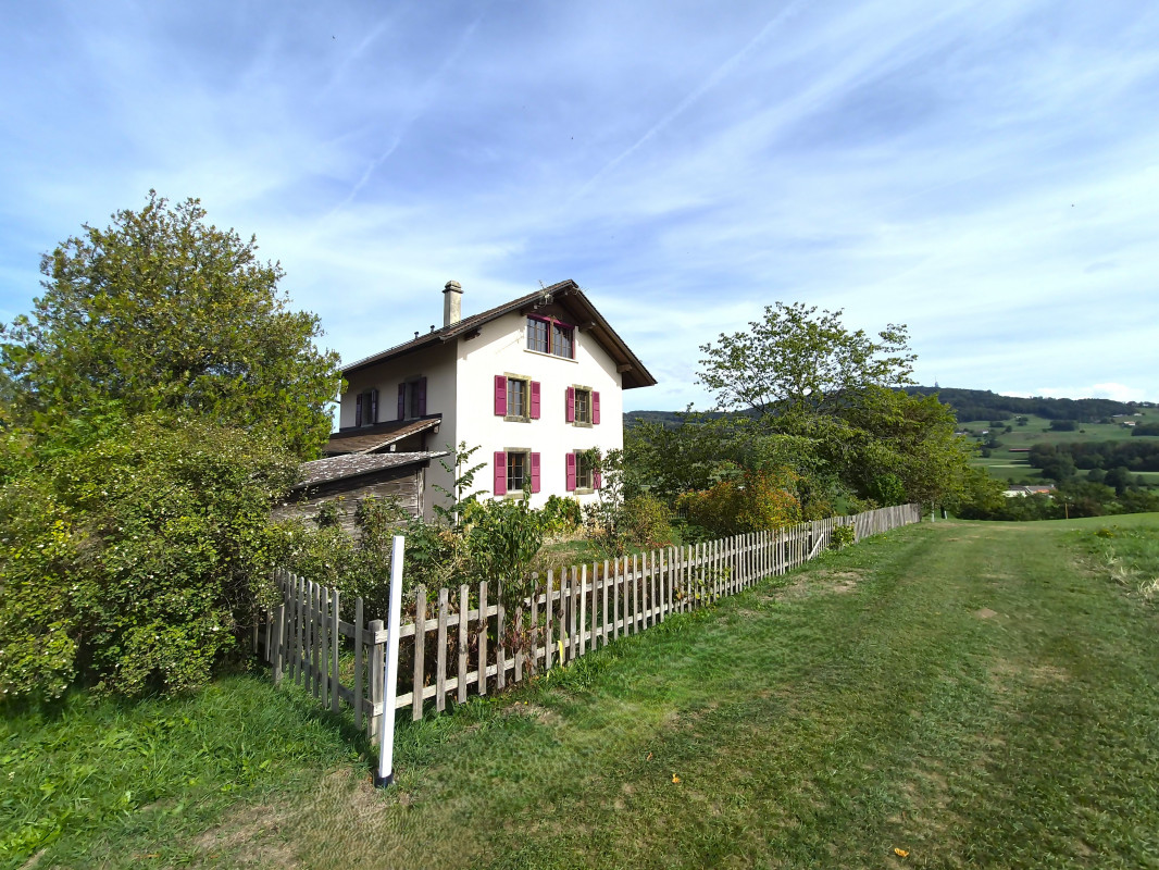 Une propriété de caractère dans l'écrin de verdure du Golf de Lavaux