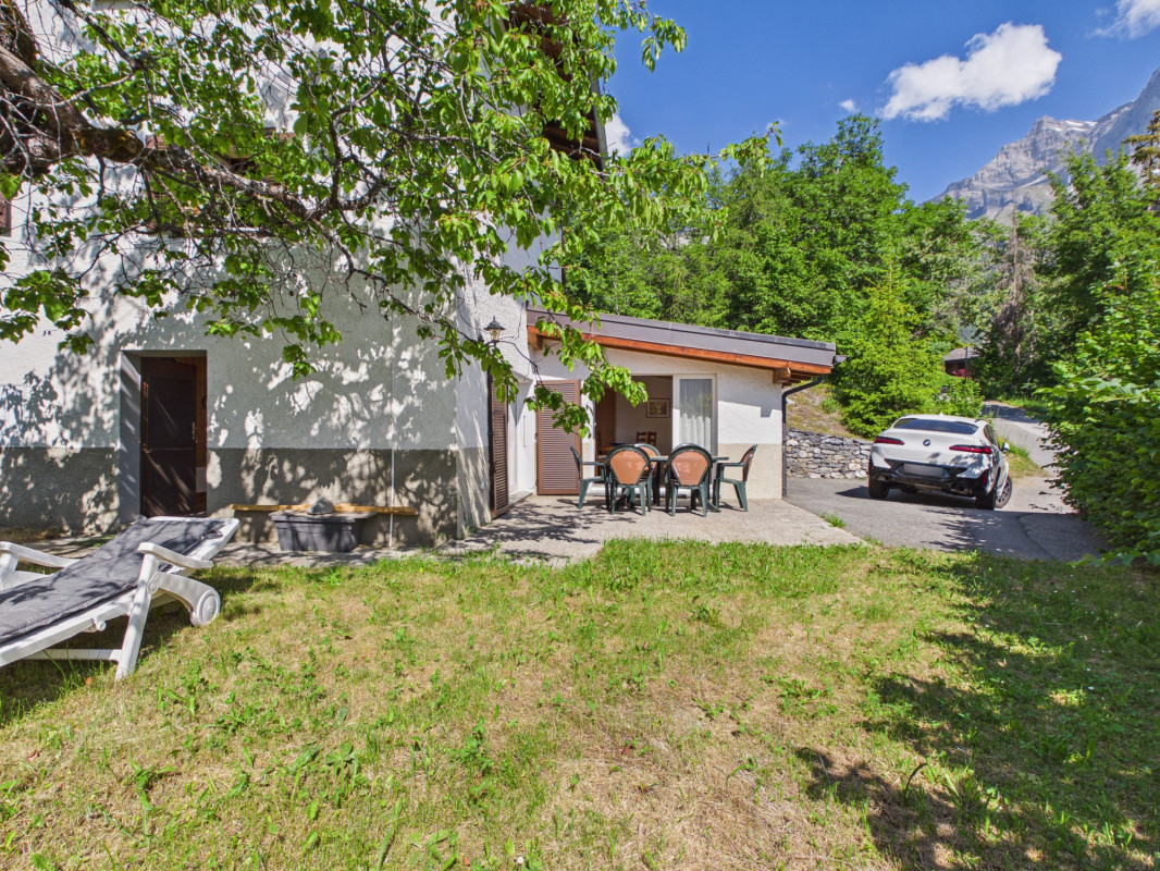 Chalet mitoyen avec cachet dans un environnement paisible et verdoyant